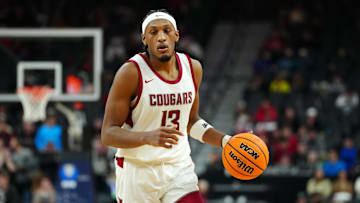 Mar 15, 2024; Las Vegas, NV, USA; Washington State Cougars forward Isaac Jones (13) dribbles.