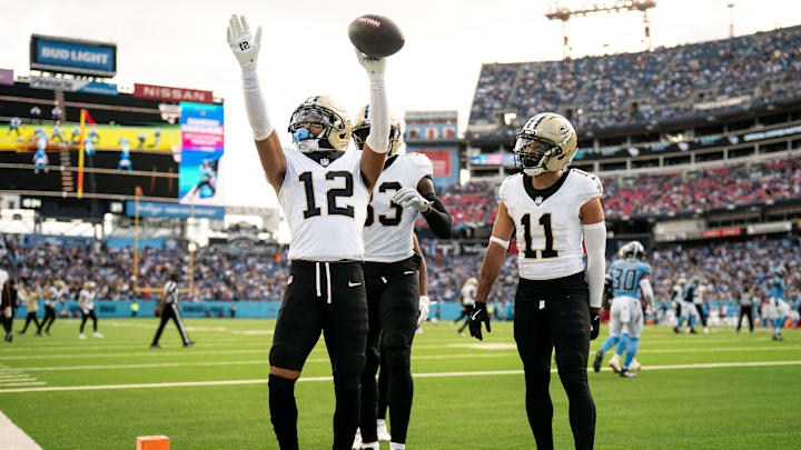 New Orleans Saints wide receiver Chris Olave (12) celebrates his touchdown against the Tennessee Titans during the third quarter at Nissan Stadium in Nashville, Tenn., Sunday, Dec. 28, 2025.