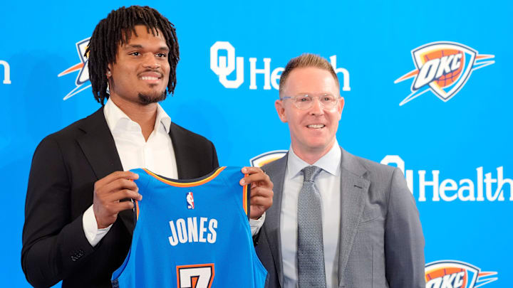 Dillon Jones stands with Thunder general manager Sam Presti during an introductory press conference for the 2024 Thunder draft picks at Oklahoma Contemporary Arts Center in Oklahoma City, Saturday, June, 29, 2024.