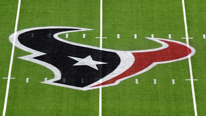 Houston Texans logo is seen on the field before a game. Houston Texans logo is seen on the field before a game.