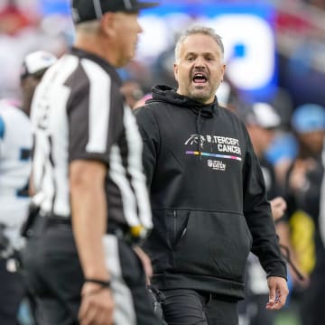 Oct 9, 2022; Charlotte, North Carolina, USA; Carolina Panthers head coach Matt Rhule shouts to an official during the second half against the San Francisco 49ers at Bank of America Stadium. 