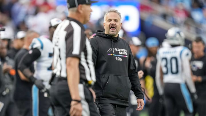 Oct 9, 2022; Charlotte, North Carolina, USA; Carolina Panthers head coach Matt Rhule shouts to an official during the second half against the San Francisco 49ers at Bank of America Stadium. 