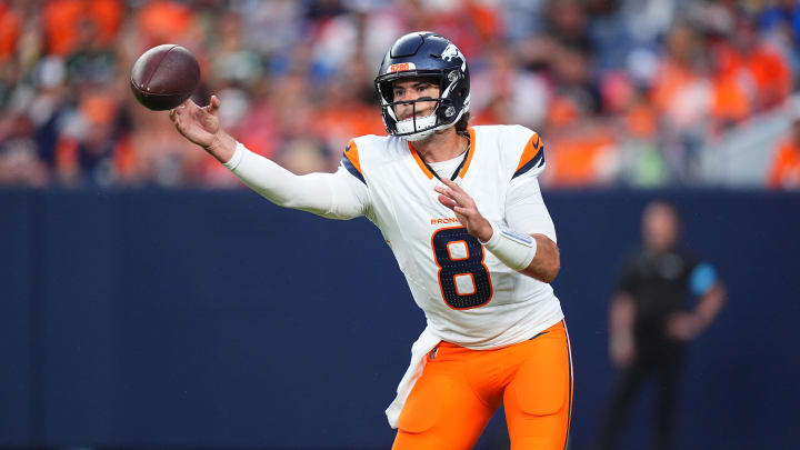 Aug 18, 2024; Denver, Colorado, USA; Denver Broncos quarterback Jarrett Stidham (8) passes the ball in the second quarter against the Green Bay Packers at Empower Field at Mile High. 