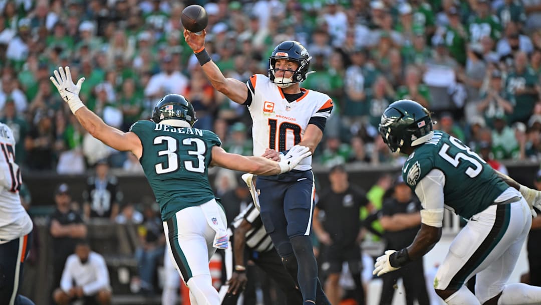 Oct 5, 2025; Philadelphia, Pennsylvania, USA; Denver Broncos quarterback Bo Nix (10) throws a pass order Philadelphia Eagles cornerback Cooper Dejean (33) during the fourth quarter at Lincoln Financial Field. Mandatory Credit: Eric Hartline-Imagn Images