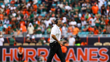 Nov 2, 2024; Miami Gardens, Florida, USA; Miami Hurricanes head coach Mario Cristobal looks on from the field against the Duke Blue Devils during the fourth quarter at Hard Rock Stadium. Mandatory Credit: Sam Navarro-Imagn Images