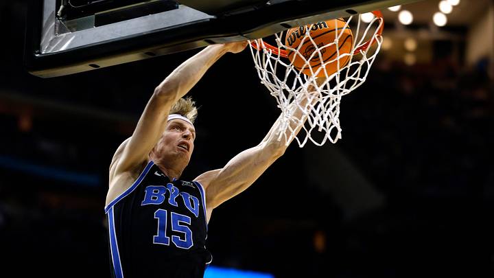 BYU's Richie Saunders finishes at the rim vs the Alabama Crimson Tide
