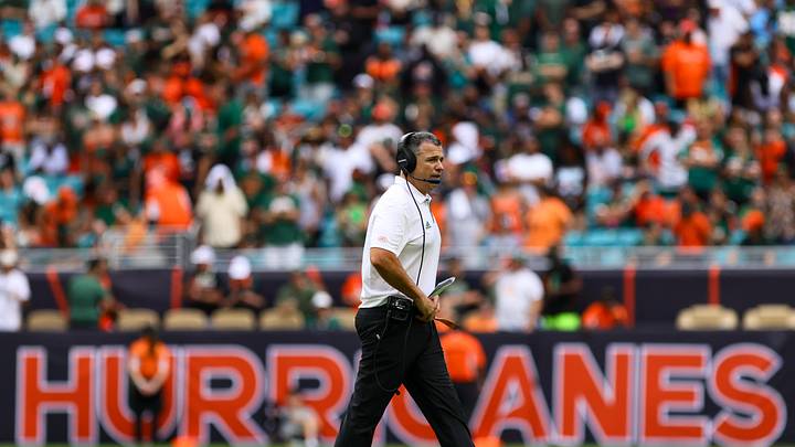 Nov 2, 2024; Miami Gardens, Florida, USA; Miami Hurricanes head coach Mario Cristobal looks on from the field against the Duke Blue Devils during the fourth quarter at Hard Rock Stadium. Mandatory Credit: Sam Navarro-Imagn Images