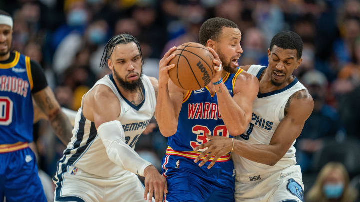 Dec 23, 2021; San Francisco, California, USA; Memphis Grizzlies forward Dillon Brooks (24) and guard De'Anthony Melton (0) pressure Golden State Warriors guard Stephen Curry (30) during the third quarter at Chase Center. Mandatory Credit: Neville E. Guard-USA TODAY Sports