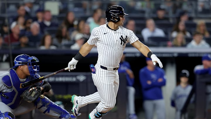 Sep 9, 2024; Bronx, New York, USA; New York Yankees center fielder Jasson Dominguez (89) follows through on a single against the Kansas City Royals during the fourth inning at Yankee Stadium. Mandatory Credit: Brad Penner-Imagn Images