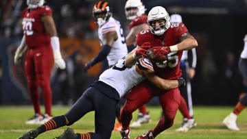Dec 24, 2023; Chicago, Illinois, USA; Arizona Cardinals tight end Trey McBride (85) is hit by Chicago Bears linebacker T.J. Edwards (53) just after catching a pass in the second half at Soldier Field. Mandatory Credit: Jamie Sabau-USA TODAY Sports