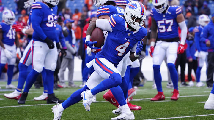 Buffalo Bills running back James Cook warms up before a game against the Denver Broncos in an AFC wild-card game. Buffalo Bills running back James Cook warms up before a game against the Denver Broncos in an AFC wild-card game.