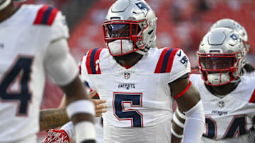 Aug 25, 2024; Landover, Maryland, USA;  New England Patriots safety Jabrill Peppers (5) takes the field with teammates before the game against the Washington Commanders at Commanders Field. Mandatory Credit: Tommy Gilligan-Imagn Images