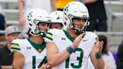 Oct 18, 2025; Fort Worth, Texas, USA; Baylor Bears quarterback Sawyer Robertson (13) warms up prior to a game against the TCU Horned Frogs at Amon G. Carter Stadium. Mandatory Credit: Raymond Carlin III-Imagn Images