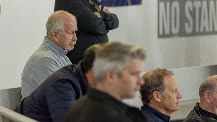 Aug 3, 2024; Plymouth, MI, USA; General manager of the NHL Dallas Stars, Jim Hill, scouts players in the game between Finland and Sweden during the third period of the 2024 World Junior Summer Showcase at USA Hockey Arena. Mandatory Credit: David Reginek-Imagn Images