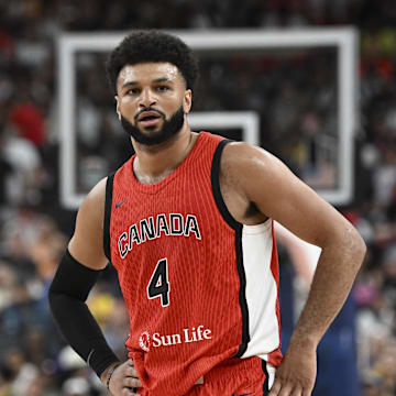 Jul 10, 2024; Las Vegas, Nevada, USA; Canada guard Jamal Murray (4) looks on in the second quarter against USA in the USA Basketball Showcase at T-Mobile Arena. Mandatory Credit: Candice Ward-Imagn Images