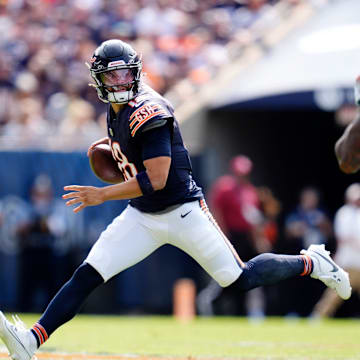 Chicago Bears quarterback Caleb Williams (18) is pressured by Tennessee Titans linebacker Harold Landry III (58) during the fourth quarter at Soldier Field in Chicago, Ill., Sunday, Sept. 8, 2024.