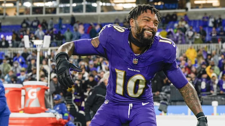 Dec 10, 2023; Baltimore, Maryland, USA; Baltimore Ravens cornerback Arthur Maulet (10) celebrates after winning in overtime against the Los Angeles Rams at M&T Bank Stadium. Mandatory Credit: Jessica Rapfogel-Imagn Images