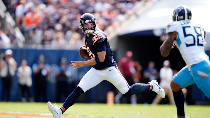 Chicago Bears quarterback Caleb Williams (18) is pressured by Tennessee Titans linebacker Harold Landry III (58) during the fourth quarter at Soldier Field in Chicago, Ill., Sunday, Sept. 8, 2024.