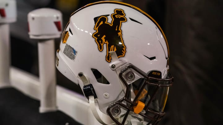 Nov 19, 2022; Laramie, Wyoming, USA; A general view of   Wyoming Cowboys helmet against the Boise State Broncos at Jonah Field at War Memorial Stadium. Mandatory Credit: Troy Babbitt-USA TODAY Sports