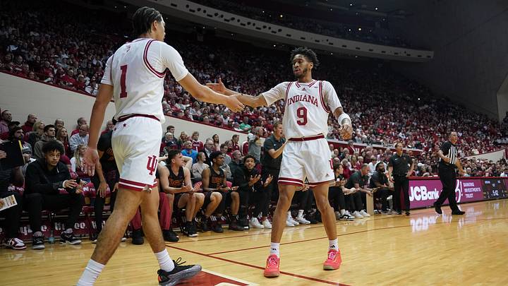 Jan 8, 2025; Bloomington, Indiana, USA; Indiana Hoosiers guard Myles Rice (1) and Indiana Hoosiers guard Kanaan Carlyle (9) high-five after a play during the first half against the USC Trojans at Simon Skjodt Assembly Hall. Mandatory Credit: Robert Goddin-Imagn Images