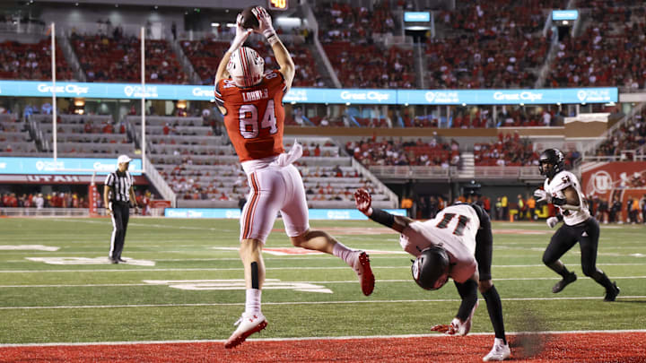 Aug 29, 2024; Salt Lake City, Utah, USA; Utah Utes tight end Caleb Lohner (84) jumps for a pass against Southern Utah Thunderbirds safety Brendan Hale (11) during the third quarter at Rice-Eccles Stadium. Mandatory Credit: Rob Gray-Imagn Images Aug 29, 2024; Salt Lake City, Utah, USA; Utah Utes tight end Caleb Lohner (84) jumps for a pass against Southern Utah Thunderbirds safety Brendan Hale (11) during the third quarter at Rice-Eccles Stadium. Mandatory Credit: Rob Gray-Imagn Images
