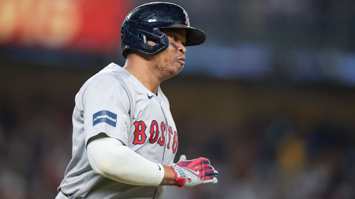 Jul 7, 2024; Bronx, New York, USA; Boston Red Sox third baseman Rafael Devers (11) runs the bases during his solo home run during the ninth inning against the New York Yankees at Yankee Stadium. Mandatory Credit: Vincent Carchietta-USA TODAY Sports