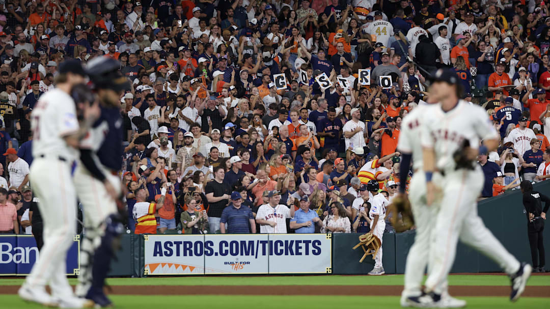 Apr 19, 2025; Houston, Texas, USA; Fans celebrate the Houston Astros win after defeating the San Diego Padres at Daikin Park.