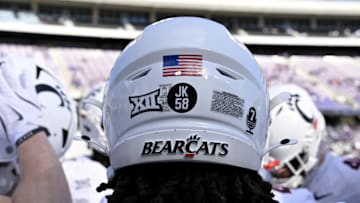 Nov 29, 2025; Fort Worth, Texas, USA; A view of the JK 58 decal on the back of the helmet of Cincinnati Bearcats defensive end Mikah Coleman (4) before the game at Amon G. Carter Stadium. Mandatory Credit: Jerome Miron-Imagn Images