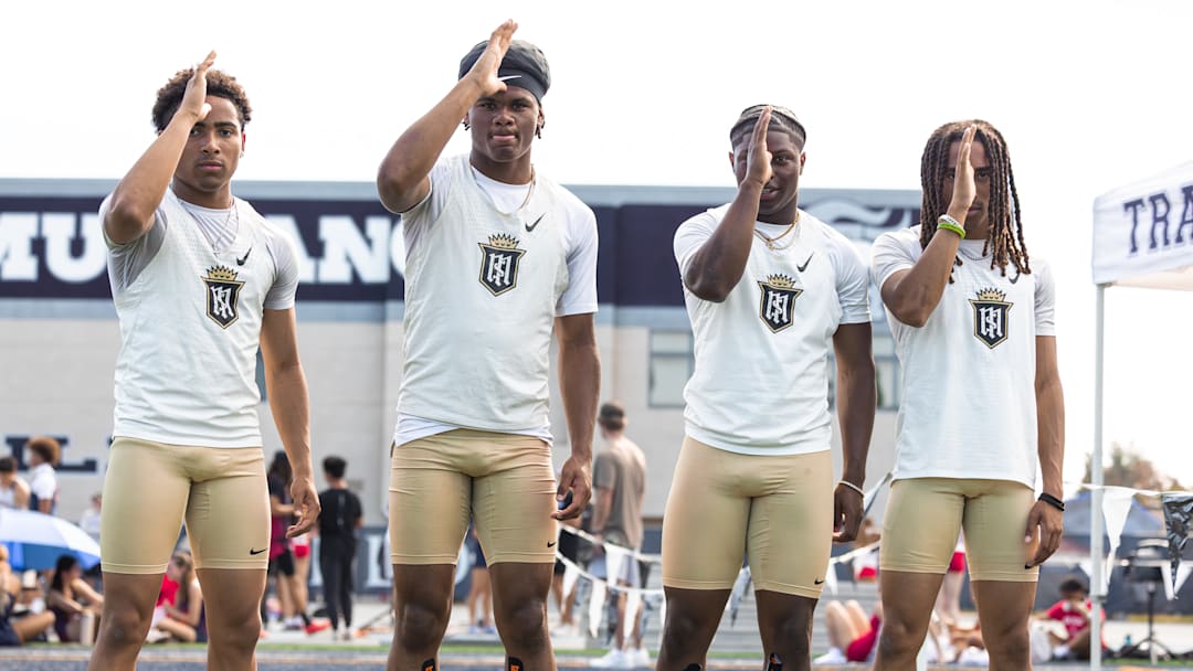 From left, Jordan Wells, Kamil Pelovello, Benjamin Harris and Jace Wells pose after setting a national-leading time in the 4x100-meter relay at the Mustang Round Up at Trabuco Hills High School.