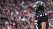Nov 15, 2025; Cincinnati, Ohio, USA;  Cincinnati Bearcats quarterback Brendan Sorsby (2) reacts to his team’s touchdown against the Arizona Wildcats in the second half at Nippert Stadium. Mandatory Credit: Aaron Doster-Imagn Images