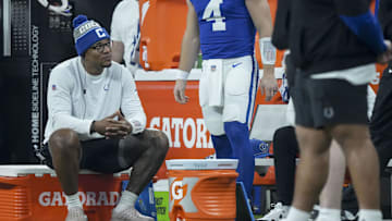 Jan 5, 2025; Indianapolis, Indiana, USA; Indianapolis Colts quarterback Anthony Richardson (5) sits on the sideline during a game against the Jacksonville Jaguars at Lucas Oil Stadium. Mandatory Credit: Grace Hollars-USA TODAY Network via Imagn Images