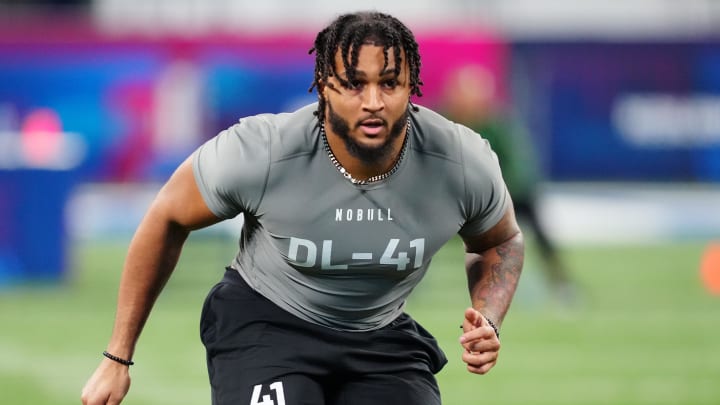 Feb 29, 2024; Indianapolis, IN, USA; Western Michigan defensive lineman Marshawn Kneeland (DL41) works out during the 2024 NFL Combine at Lucas Oil Stadium. Mandatory Credit: Kirby Lee-USA TODAY Sports