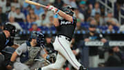 Aug 1, 2025; Miami, Florida, USA; Miami Marlins left fielder Kyle Stowers (28) hits a grand slam against the New York Yankees seventh inning at loanDepot Park.