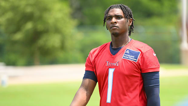 Jun 10, 2025; Nashville, TN, USA; Tennessee Titans quarterback Cam Ward (1) walks off the field during minicamp at Nissan