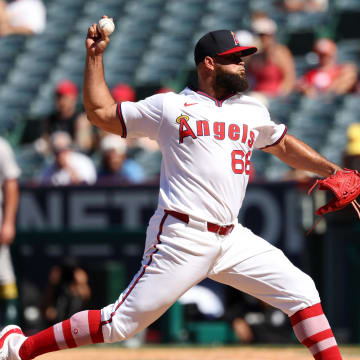 Jul 28, 2024; Anaheim, California, USA;  Los Angeles Angels relief pitcher Luis Garcia (66) pitches during the ninth inning against the Oakland Athletics at Angel Stadium. Mandatory Credit: Kiyoshi Mio-USA TODAY Sports