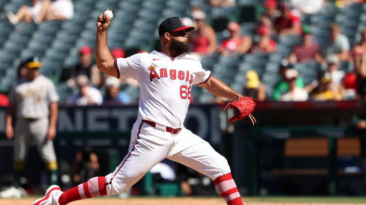 Jul 28, 2024; Anaheim, California, USA;  Los Angeles Angels relief pitcher Luis Garcia (66) pitches during the ninth inning against the Oakland Athletics at Angel Stadium. Mandatory Credit: Kiyoshi Mio-USA TODAY Sports