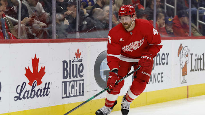 Dec 27, 2024; Detroit, Michigan, USA;  Detroit Red Wings defenseman Jeff Petry (46) skates with the puck in the third period against the Toronto Maple Leafs at Little Caesars Arena. Mandatory Credit: Rick Osentoski-Imagn Images