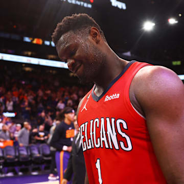 Dec 17, 2022; Phoenix, Arizona, USA; New Orleans Pelicans forward Zion Williamson (1) reacts as he leaves the court following the game against the Phoenix Suns at Footprint Center. Mandatory Credit: Mark J. Rebilas-Imagn Images