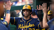 Milwaukee Brewers left fielder Christian Yelich (22) celebrates after scoring a run against the Washington Nationals at Nationals Park. 