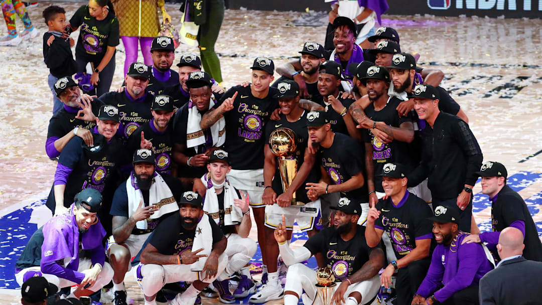 Oct 11, 2020; Lake Buena Vista, Florida, USA; The Los Angeles Lakers pose for a photo after their win over the Miami Heat after game six of the 2020 NBA Finals at AdventHealth Arena. The Los Angeles Lakers won 106-93 to win the series. Mandatory Credit: Kim Klement-Imagn Images