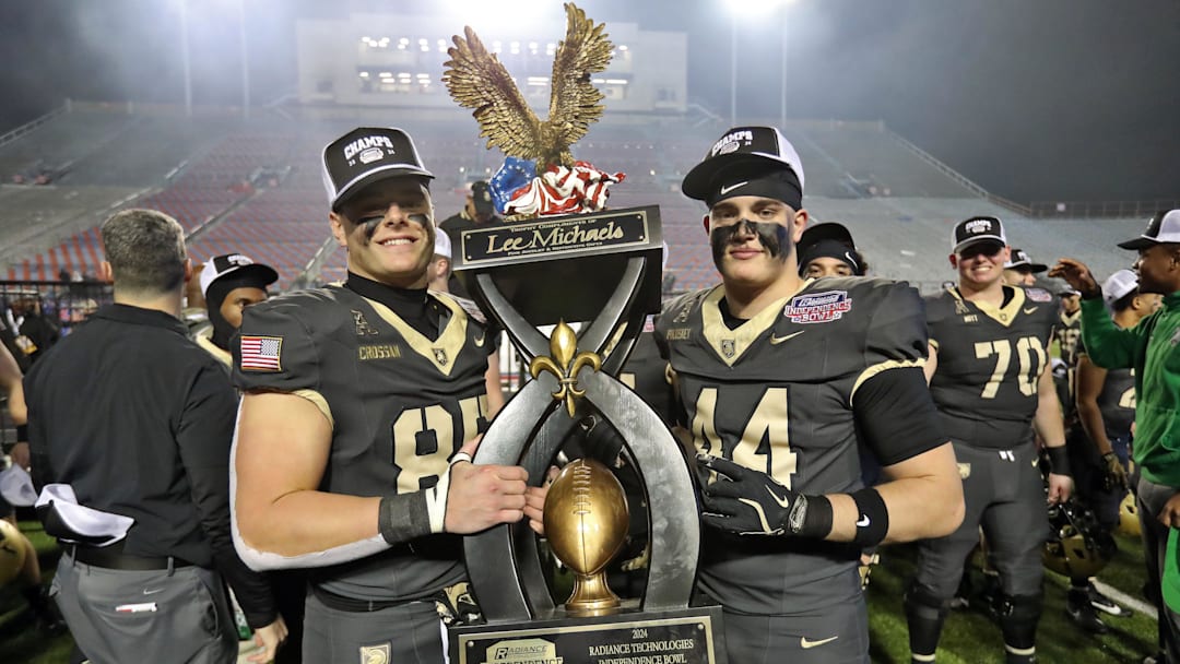 Dec 28, 2024; Shreveport, LA, USA; The Army Black Knights celebrate a 27-6 win against the Louisiana Tech Bulldogs to capture the 2024 Radiance Technologies Independence Bowl at Independence Stadium. Dec 28, 2024; Shreveport, LA, USA; The Army Black Knights celebrate a 27-6 win against the Louisiana Tech Bulldogs to capture the 2024 Radiance Technologies Independence Bowl at Independence Stadium.