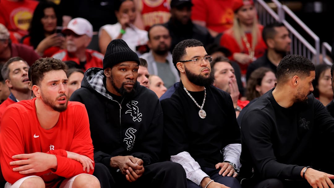May 1, 2026; Houston, Texas, USA; Houston Rockets forward Kevin Durant (7) and Houston Rockets guard Fred VanVleet (5) sit on the bench against the Los Angeles Lakers during the third quarter of game six of the first round of the 2026 NBA Playoffs at Toyota Center. Mandatory Credit: Erik Williams-Imagn Images