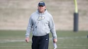 Purdue Boilermakers head coach Barry Odom looks down field 
