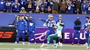 Nov 9, 2024; Winnipeg, Manitoba, CAN;  Winnipeg Blue Bombers wide receiver Kenny Lawler (89) looks to break the tackles on Saskatchewan Roughriders defensive back DaMarcus Fields (22)during the first half of the game between the Winnipeg Blue Bombers and the Saskatchewan Roughriders at Princess Auto Stadium. Mandatory Credit: Bruce Fedyck-Imagn Images