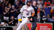 May 14, 2024; Houston, Texas, USA; Houston Astros pinch runner Trey Cabbage (38) crosses home plate to score the game-winning run against the Oakland Athletics during the tenth inning at Minute Maid Park.