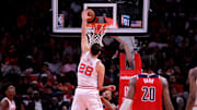 Nov 12, 2025; Houston, Texas, USA; Houston Rockets center Alperen Sengun (28) dunks against the Washington Wizards during the third quarter at Toyota Center. Mandatory Credit: Erik Williams-Imagn Images