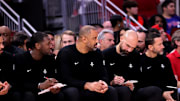 Nov 12, 2025; Houston, Texas, USA; Houston Rockets head coach Ime Udoka (center) on the bench against the Washington Wizards during the second quarter at Toyota Center. Mandatory Credit: Erik Williams-Imagn Images