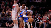 Apr 4, 2025; Houston, Texas, USA; Oklahoma City Thunder guard Shai Gilgeous-Alexander (2) secures the ball against the Houston Rockets during the third quarter at Toyota Center. Mandatory Credit: Erik Williams-Imagn Images