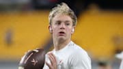 Former Virginia Cavaliers quarterback Anthony Colandrea warms up before a game against the Pittsburgh Panthers at Acrisure Stadium. 