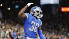 Detroit Lions safety C.J. Moore (38) celebrates a play.
